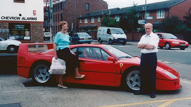A picture of JC’s mum and dad next to the ex-Nigel Mansell Ferrari F40